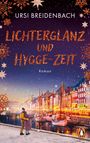 "Lichterglanz und Hygge-Zeit", Roman von Ursi Breidenbach. Winterliche Hafenansicht mit Lichtern und einem Paar.