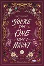 Buchcover mit dem Titel "You’re the One That I Haunt" von Katie Jung. Florale Verzierungen und mystische Symbole.