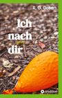 "Ich nach dir" und "R. G. Green". Ein orangefarbener Luftballon liegt auf einem kiesigen Boden.