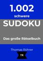 Text: "1.002 schwere SUDOKU Das große Rätselbuch Thomas Röhrer TR". Design mit blauem und grauem Hintergrund.