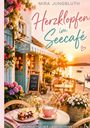 „Herzklopfen im Seecafé“ von Mira Jungbluth. Romantisches Café am See mit einem Tisch, Blumen und Sonnenuntergang.