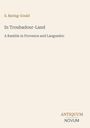 Text: "S. Baring-Gould. In Troubadour-Land. A Ramble in Provence and Languedoc. ANTIQUUM NOVUM". Schlichte, beige Hintergrund.
