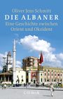 Text: "Oliver Jens Schmitt, DIE ALBANER, Eine Geschichte zwischen Orient und Okzident." Gebäude mit Minarett und Flagge.