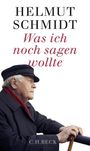 "Helmut Schmidt: Was ich noch sagen wollte." Ein älterer Mann in Mantel und Mütze mit verschränkten Händen auf einem Stock.