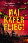 "MAIKÄFER FLIEG!" steht in großen gelben Buchstaben vor einem düsteren Himmel mit Mützenspuren und zerstörten Gebäuden.