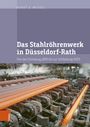 "Buchcover: 'Das Stahlröhrenwerk in Düsseldorf-Rath' von Horst A. Wessel, zeigt heiße Stahlrohren in einer Fabrik."