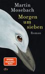 „Martin Mosebach, Morgen um sieben, Roman“. Ein weißer Möwenkopf auf schwarzem Hintergrund, dtv-Logo.