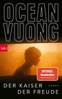 "OCEAN VUONG", "DER KAISER DER FREUDE", "SPIEGEL Bestseller". Silhouette eines Menschen in orangefarbenem Licht.