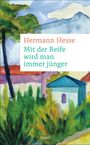 Hermann Hesse: Mit der Reife wird man immer jünger. Illustration eines bunten Hauses und Bäumen im Hintergrund.