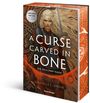 Danielle L. Jensen: A Curse Carved in Bone - Die Skaland-Saga, Band 2, Buch