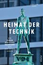 "Heimat der Technik" von Sebastian Teupe. Bronzestatue vor modernem Gebäude. Auf der Plakette steht "VDI".