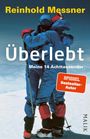"Reinhold Messner: Überlebt - Meine 14 Achttausender", darunter zwei Bergsteiger in blauen Anzügen auf Schnee.