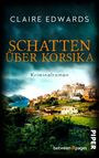 Text: „SCHATTEN ÜBER KORSIKA“, „Kriminalroman“, „CLAIRE EDWARDS“, „between pages“, „PIPER“. Ansicht einer Küstenstadt.