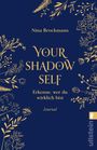 Text: "Nina Brockmann YOUR SHADOW SELF Erkenne, wer du wirklich bist Journal." Goldene florale Muster auf dunkelblau.