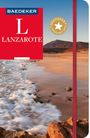 Reiseführer "BAEDEKER LANZAROTE" mit Strandmotiv, Meer im Vordergrund, Berge im Hintergrund.