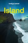 Text: "lonely planet", "Island". Küstenlandschaft mit schwarzem Sandstrand und grünen Klippen unter Polarlichtern.