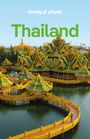 Text: "lonely planet" oben, "Thailand" groß in der Mitte. Untere Hälfte zeigt einen gold-grünen Tempelkomplex auf Wasser.