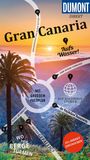 Großer Text: "Gran Canaria". Weitere Texte: "DUMONT DIREKT", "Mit großem Faltplan". Landschaft mit Palmen und Sonnenuntergang im Hintergrund.