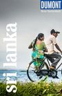 "DUMONT Reise-Taschenbuch", "Sri Lanka" in Weiß. Ein Mann und eine Frau auf einem Fahrrad entlang eines Gewässers.