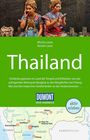 "Thailand - Entdeckungsreisen im Land der Tempel und Elefanten" und Karte. Zwei Frauen in traditioneller Kleidung.