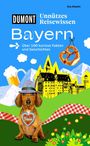 Buchtitel: "Unnützes Reisewissen Bayern", mit Dackel, Brezel und bayerischem Schloss vor Alpenhintergrund.