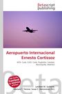 "Aeropuerto Internacional Ernesto Cortissoz" in roter Schrift, darüber ein Flugzeug gegen violettem Himmel, Herausgebernamen unten.