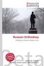 "Russian Orthodoxy, Old Believers, Russian Orthodox Church" steht über einer Statue im Schnee, umgeben von Bäumen.