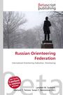 "Russian Orienteering Federation" in roter Schrift. Eine Statue unter kahlen Bäumen im Schnee im Hintergrund.