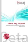 Text: "Venus Bay, Victoria. Victoria (Australia), George Bass, Nicholas Baudin, Anderson Inlet." Logo oben rechts. Türkise Linien formen dynamische Muster.