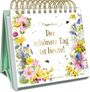 „Der schönste Tag ist heute!“ ist in goldener Schrift zentriert. Buntes Blumen- und Schmetterlingsdesign umrahmt den Text.