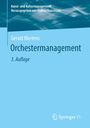 „Kunst- und Kulturmanagement“, „Orchestermanagement“, 3. Auflage, Gerald Mertens, hellblaues Design mit geometrischem Muster.