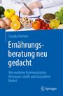 "Ernährungsberatung neu gedacht" - Buch über Kommunikation und Gesundheit. Obst, Gemüse und Notizbuch im Hintergrund.