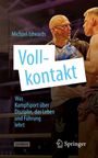 Ein Boxtrainer spricht zu einem Boxer im Ring. Der Titel lautet "Vollkontakt". Es geht um Kampfsport und Führung.