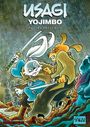 „USAGI YOJIMBO: Zweihundert Jizo“. Illustration: Samurai-Hase in Kampfpose, Regen, viele Steinskulpturen im Hintergrund.