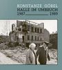 Konstanze Göbel Halle im Umbruch 1987–1989. Zwei ältere Personen gehen vor einem teils zerstörten Gebäude.