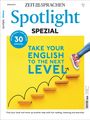 Text: "Spotlight Spezial", "Take your English to the next level". Illustration: Treppe mit Fuß in UK-Flagge-Schuh.