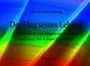 Texte: "Ulrich Ernst Ludwig", "Der Flug seines Lebens", "Ein Geheimnis vom Fliegen und Loslassen...". Farbverlauf in Regenbogenfarben.