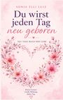 „Du wirst jeden Tag neu geboren“ ist in großer Schrift zu lesen. Darum ein Herz aus rosa Blüten und Blättern.