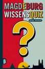 "Magdeburg Wissensquiz: 100 Fragen - 400 Antworten". Großes gelbes Fragezeichen, stilisierte Stadtsilhouette.