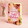 "Erdbeerherz sucht Sahnehäubchen. Zweite Chancen." Roman von Liana Milano. Bunte Dessertabbildungen und Blumen.