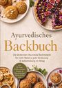 Text: Ayurvedisches Backbuch. Leckere Ayurveda Backrezepte. Verschiedene Backwaren auf Tellern mit Nüssen, Früchten.