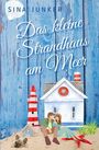 "Das kleine Strandhaus am Meer." Illustration: Ein Paar sitzt vor einem Leuchtturm und einem Haus am Strand, Hund daneben.