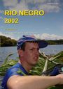 Text: „RIO NEGRO 2002. DEINE MISSION: ENTSCHEIDE, WIE ES WEITERGEHT.” Mann in blauer Mütze im Wasser.
