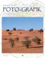 „FOTO-GRAFIK“ – Impressionen aus sechs Jahrzehnten Fotografie. Wüstenlandschaft mit Bäumen und blauem Himmel.