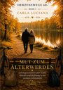 HERZENSWEGE 60+ BAND 2 CARLA LUCIANA. Zwei Menschen gehen einen herbstlichen Waldweg entlang eines Sees.