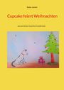 Titel: "Cupcake feiert Weihnachten" von Sunny Lorenz. Illustration: Ein Hund sitzt vor einem Weihnachtsbaum und einem Geschenk.