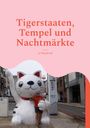 „Tigerstaaten, Tempel und Nachtmärkte“ von Jo Walsdorff. Ein Mann posiert neben einer großen Glückskatze.