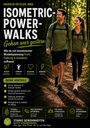 "ISOMETRIC-POWER-WALKS: Gehen war gestern. Zwei Personen wandern lächelnd durch einen grünen, sonnenbeschienenen Waldpfad."