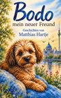 Texte: „Bodo, mein neuer Freund“, „Geschichten von Matthias Hartje“. Illustration: Ein niedlicher Hund vor einem Fluss.