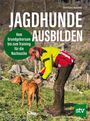 Text: "Jagdhunde ausbilden – Vom Grundgehorsam bis zum Training für die Nachsuche." Ein Mann trainiert einen Hund.